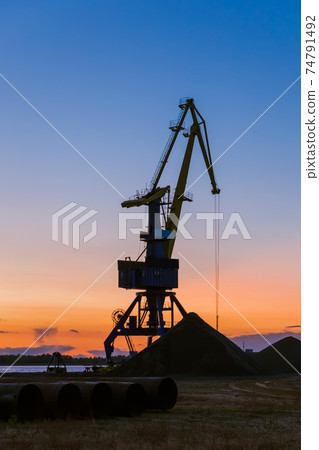 Port crane on sunset Port crane on sunset 74791492
