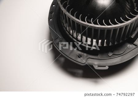 Black car heater fan with impeller on white gradient background 74792297