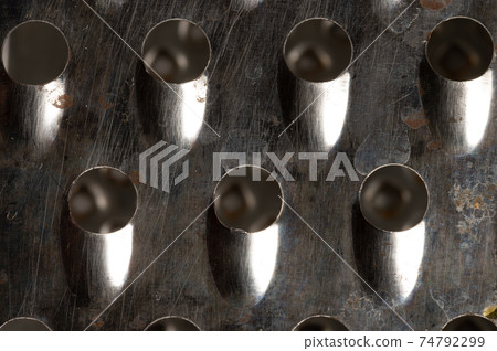 Close-up Abstract metal texture of rusted food grater 74792299