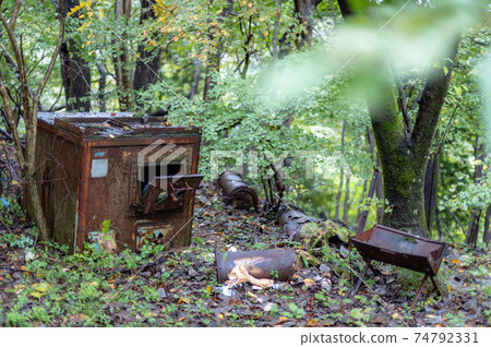 Garbage dumped in a mountain rich in nature Garbage dumped in a mountain rich in nature 74792331