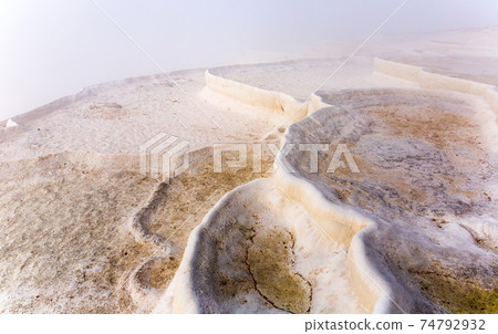 White travertine formations at hot springs of Pamukkale, Turkey White travertine formations at hot springs of Pamukkale, Turkey 74792932