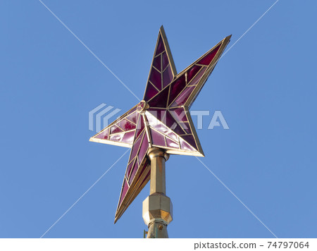 MOSCOW , RUSSIA, June 10, 2019: Ruby star on the spire of the Spasskaya Tower of the Moscow Kremlin on June 10, 2019 in Moscow, Russia MOSCOW , RUSSIA, June 10, 2019: Ruby star on the spire of the Spasskaya Tower of the Moscow Kremlin on June 10, 2019 in Moscow, Russia 74797064