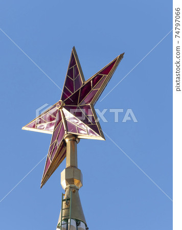MOSCOW , RUSSIA, June 10, 2019: Ruby star on the spire of the Spasskaya Tower of the Moscow Kremlin on June 10, 2019 in Moscow, Russia 74797066