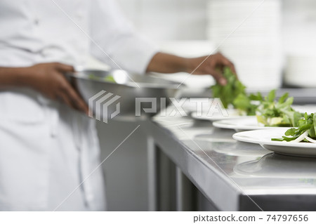 Chef Preparing Salad 74797656