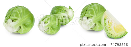 Brussels sprouts and half isolated on white background with clipping path and full depth of field. Set or collection 74798838