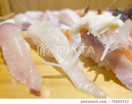 Image of 3 slices of fresh sashimi Image of 3 slices of fresh sashimi 74800352