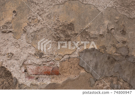 Old retro scrutched yellow brown grey plaster stucco wall background texture Old retro scrutched yellow brown grey plaster stucco wall background texture 74800947