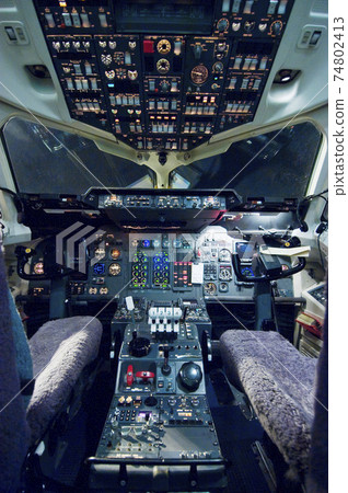 Empty aeroplane cockpit Empty aeroplane cockpit 74802413