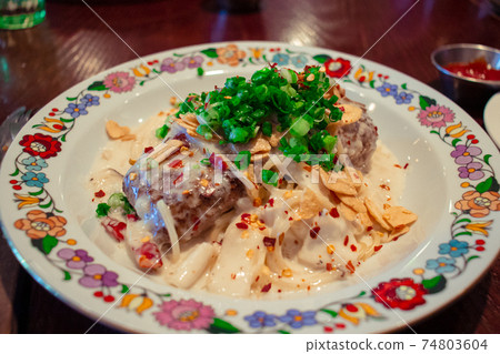 Carbonara pasta hamburger steak that looks delicious Carbonara pasta hamburger steak that looks delicious 74803604
