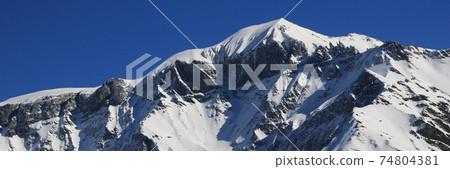 Mountains Piz Segnas and Piz Sardona in winter. View from Elm. Mountains Piz Segnas and Piz Sardona in winter. View from Elm. 74804381