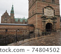 Cloudy exterior of Frederiksborg Castle 74804502