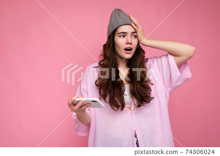 Photo of attractive crazy amazed surprised young woman wearing casual stylish clothes standing 74806024