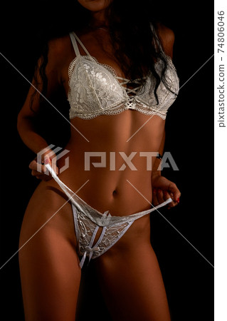 Art nude. Perfect body, sexy girl on the dark background Art nude. Perfect body, sexy girl on the dark background 74806046
