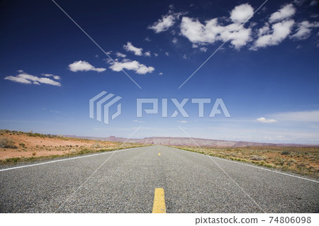 Road through desert 74806098