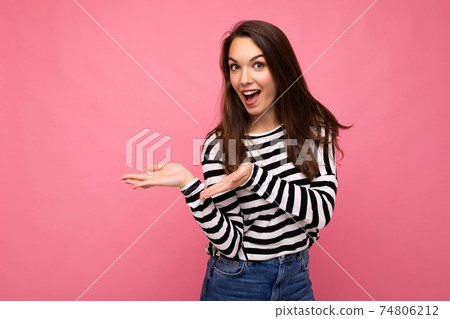 Portrait photo of young happy positive beautiful brunette woman with sincere emotions wearing casual 74806212