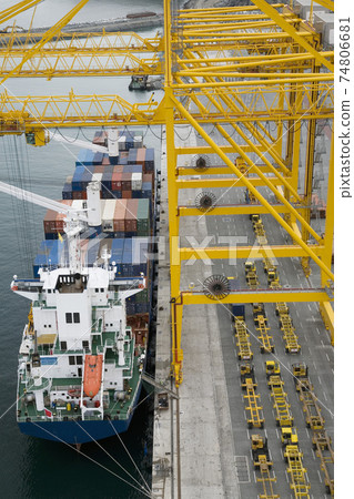Container ship in docks elevated view 74806681
