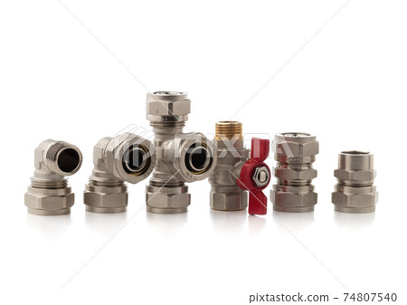 Fittings for water on a white background. Brass fittings close-up. 74807540