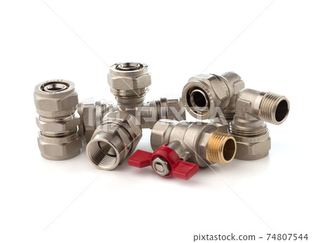 Fittings for water on a white background. Brass fittings close-up. 74807544