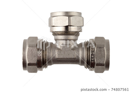 Water fitting on a white background. Brass fitting close-up. Water fitting on a white background. Brass fitting close-up. 74807561