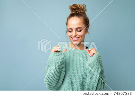 Portrait of young happy positive smiling beautiful blonde woman with sincere emotions wearing casual 74807588