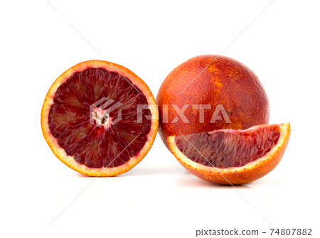 Bloody orange on a white background. Red orange and slices on a white background. 74807882