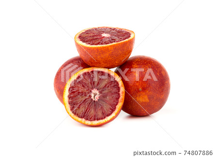 Bloody orange on a white background. Red oranges and slices on a white background. 74807886