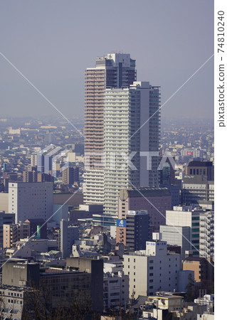 Skyscraper in front of Gifu station in spring haze Skyscraper in front of Gifu station in spring haze 74810240