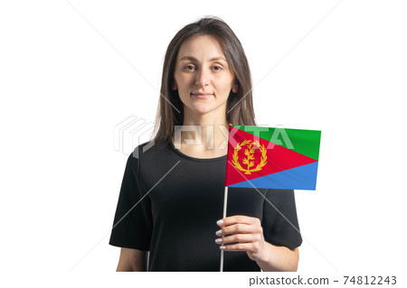 Happy young white girl holding Eritrea flag isolated on a white background Happy young white girl holding Eritrea flag isolated on a white background 74812243