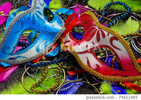 Red And Blue Carnival Masks With Feathers And Jewelry Red And Blue Carnival Masks With Feathers And Jewelry 74812405