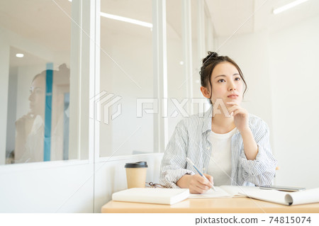 Female college student studying in the classroom 74815074