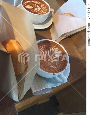 Donuts and latte at the cafe Donuts and latte at the cafe 74815192