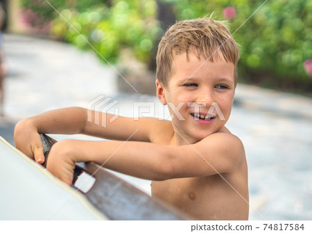 Side portrait mischievous boy, freckled nose, open mouth intriguing cunning mood, smile laugh face expression gestures. Joys Happy Childhood relationship behaviour education parenthood. Funny photo Side portrait mischievous boy, freckled nose, open mouth intriguing cunning mood, smile laugh face expression gestures. Joys Happy Childhood relationship behaviour education parenthood. Funny photo 74817584