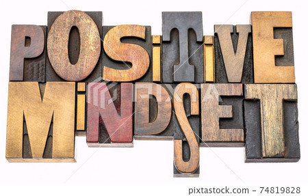 positive mindset word abstract in wood type 74819828