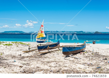 Malagasy outrigger pirogue Malagasy outrigger pirogue 74821659