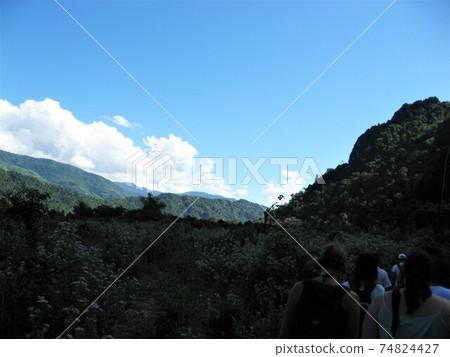 Scenery of a trekking tour in Vang Vieng, Laos. Scenery of a trekking tour in Vang Vieng, Laos. 74824427