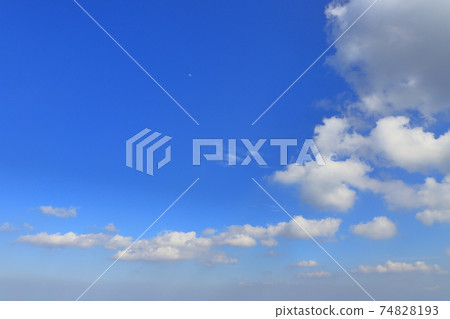 Blue sky, clouds and moon cumulus 74828193