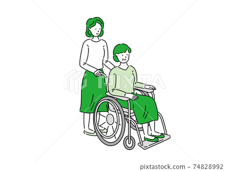 A woman pressing a wheelchair A woman pressing a wheelchair 74828992