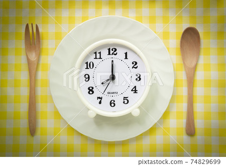 Health management at meal times, clocks, tableware, breakfast, dinner 74829699