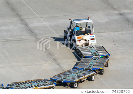 Airport scenery Towing tractor and dolly Ota-ku, Tokyo Airport scenery Towing tractor and dolly Ota-ku, Tokyo 74830703