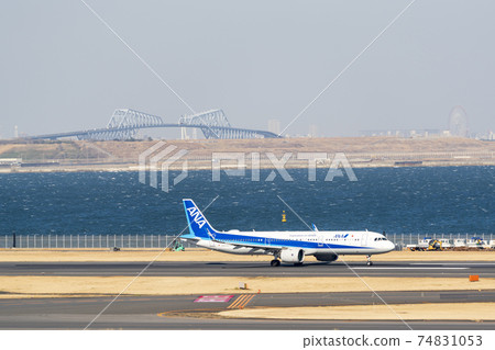 Airport scenery: Airplane taking off and Tokyo Gate Bridge, Ota-ku, Tokyo Airport scenery: Airplane taking off and Tokyo Gate Bridge, Ota-ku, Tokyo 74831053