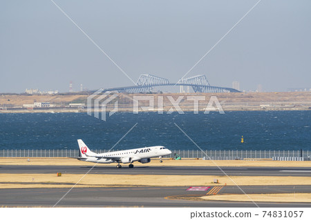Airport scenery: Airplane taking off and Tokyo Gate Bridge, Ota-ku, Tokyo Airport scenery: Airplane taking off and Tokyo Gate Bridge, Ota-ku, Tokyo 74831057