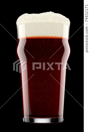 Frosty glass of fresh stout beer with bubble froth isolated on black background. 74832171