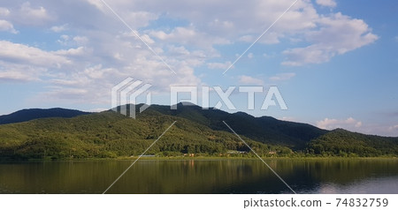 River and mountains and clouds 74832759