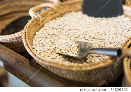 Closeup view on mongeta ganxet beans in baskets selling on shop Closeup view on mongeta ganxet beans in baskets selling on shop 74836592