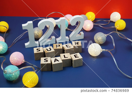 12.12 Super Sale alphabet letter with LED cotton balls on blue  background 74836989