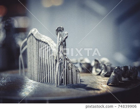 Object printed on metal 3d printer close-up Object printed on metal 3d printer close-up 74839906