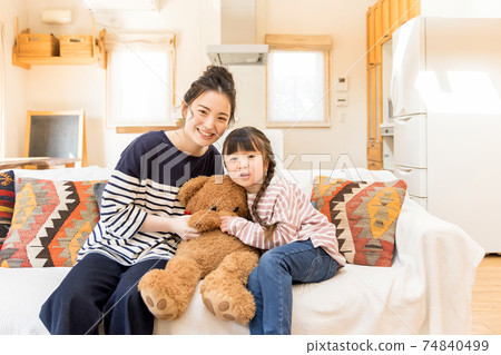 Home time, refraining from going out Parents and children playing at home Family 74840499