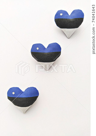 Three handmade heart in estonian flag colors brooch on white background Three handmade heart in estonian flag colors brooch on white background 74841643