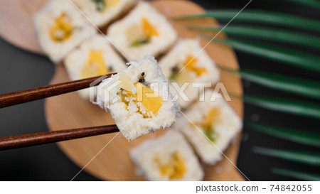 Dessert sushi. Sweet kiwi, pineapple and banana sushi rolls Dessert sushi. Sweet kiwi, pineapple and banana sushi rolls 74842055
