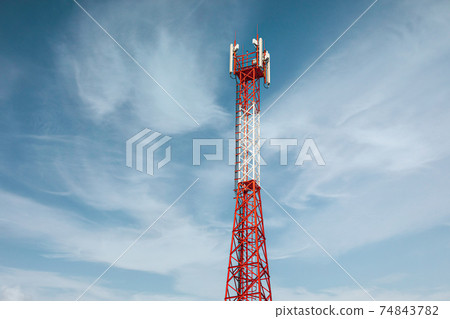 New telecommunication antenna on background of blue sky. Satellite dish telecom network at communication technology network. Telecom broadcasting tower. Modern cell tower 5G, 6G 74843782